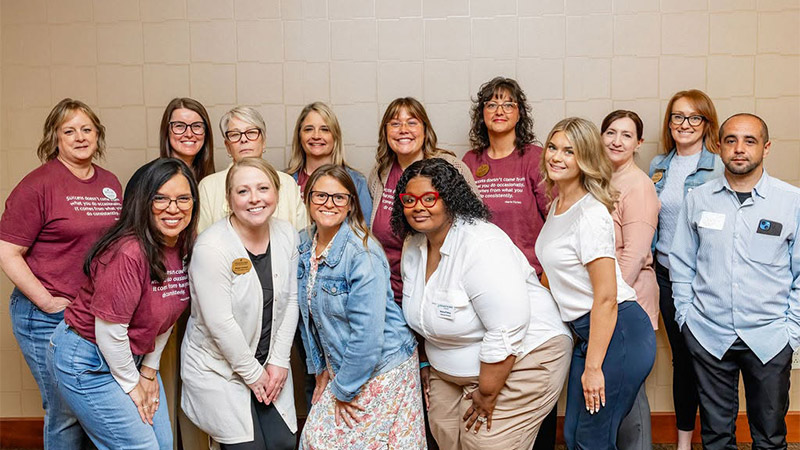 Group of Traditions employees during the annual company meeting